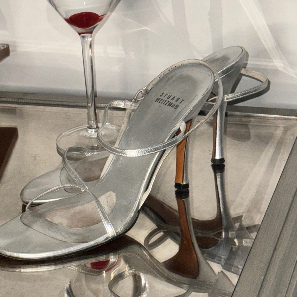 Stuart W. silver heels size 8